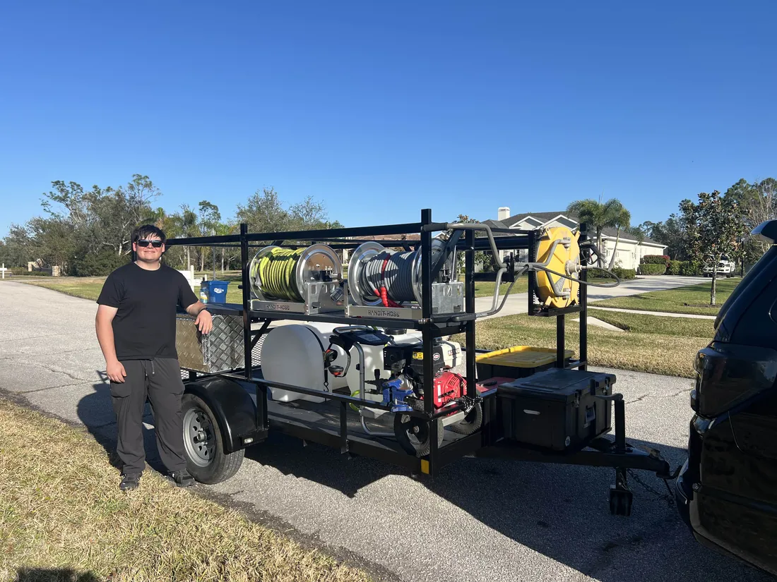 Logan Inboden and the Polar Bear Power Washing professional trailer rig in Bradenton, Florida