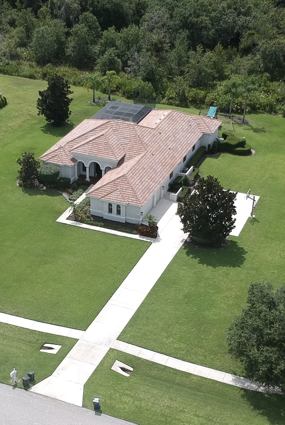 Brilliant white driveway after full driveway package in Bradenton