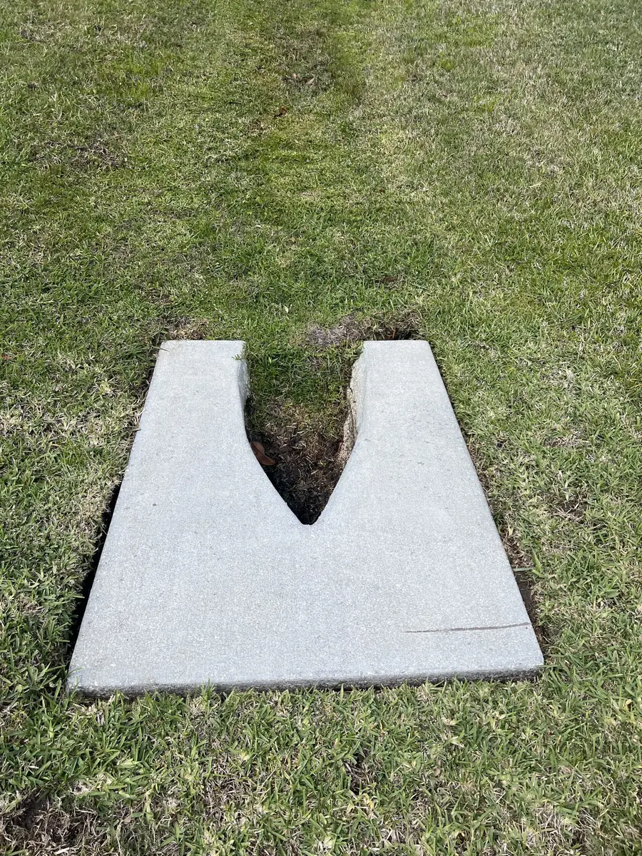Concrete culvert restored to white after cleaning in Manatee County